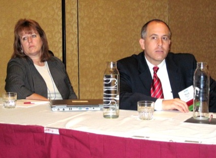 Panelists Ginger Cardona, Elekta, and Mark Kaye, Varian 